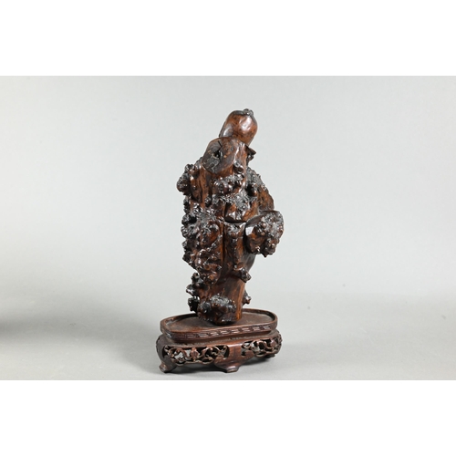 545 - A 19th century Chinese carved burr root wood figure, possibly Shou-Lao (Daoist God of Longevity) mou... 