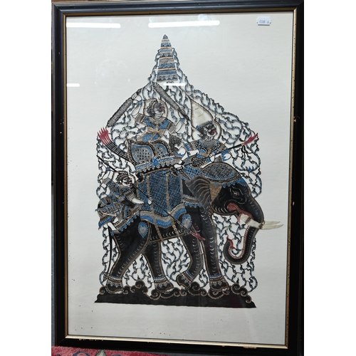 548 - Two Thai cut-out buffalo or cow hide Nang Talung poychrome shadow puppets, mounted framed and glazed... 