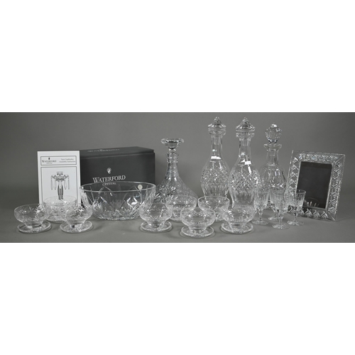 551 - A boxed Waterford Crystal Tara candelabra hung with lustres to/w three Waterford decanters and a pho... 