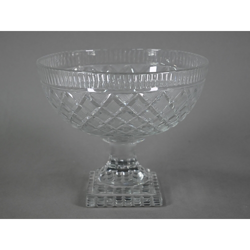 554 - An antique (possibly Irish) cut glass stemmed bowl on square base, 23 cm diameter, to/w a pair of an... 