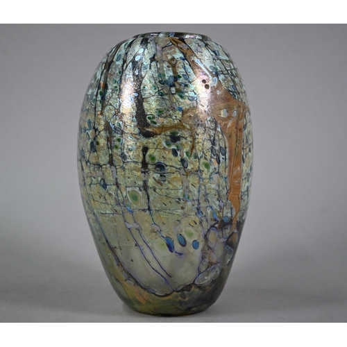 565 - Peter Layton (b 1937) - An iridescent glass ovoid vase with abstract streaked and hatched decoration... 