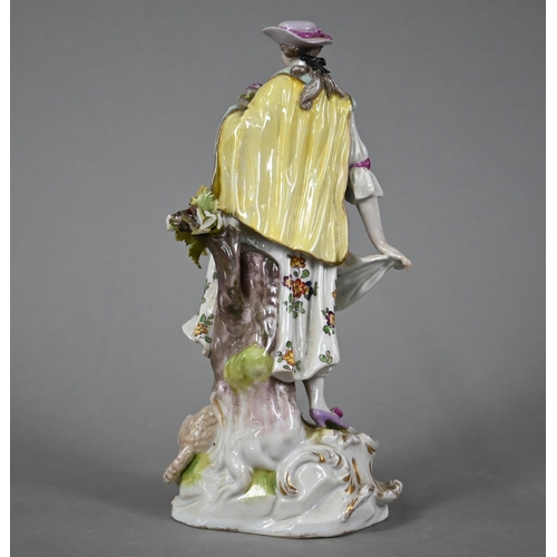 573 - A Naples china figure of a shepherdess, 20 cm high to/w a Continental bonbon dish with floral encrus... 