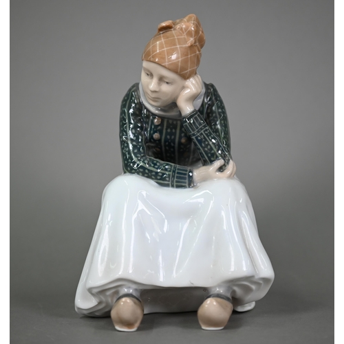 586 - A Royal Copenhagen figure, Fanoe girl, seated and bored, 1324, 21 cm