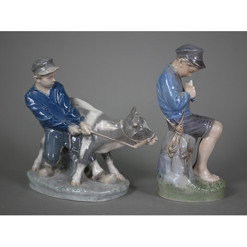 588 - A Royal Copenhagen group, Boy with Calf 772 to/w The Whittler 905 (2)