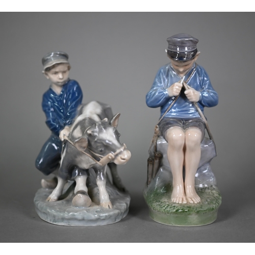 588 - A Royal Copenhagen group, Boy with Calf 772 to/w The Whittler 905 (2)