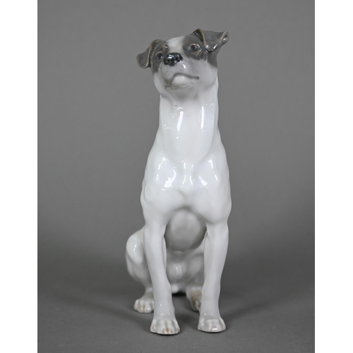 589 - A Royal Copenhagen seated terrier 1452/753, (underglaze blue L Nr 870A and wave mark), 23 cm high