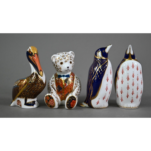 591 - Four Royal Crown Derby paperweights - Pelican, Teddy Bear and two penguins (4)