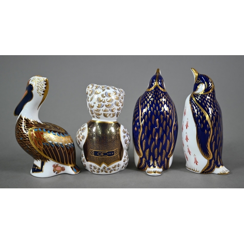 591 - Four Royal Crown Derby paperweights - Pelican, Teddy Bear and two penguins (4)