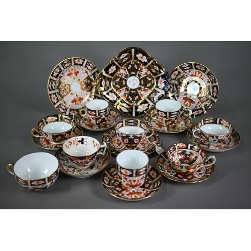 595 - Three Royal Crown Derby Imari trios of tea cup, saucer and plate, to/w five other tea cups and sauce... 