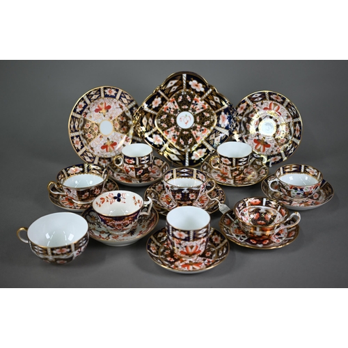 595 - Three Royal Crown Derby Imari trios of tea cup, saucer and plate, to/w five other tea cups and sauce... 