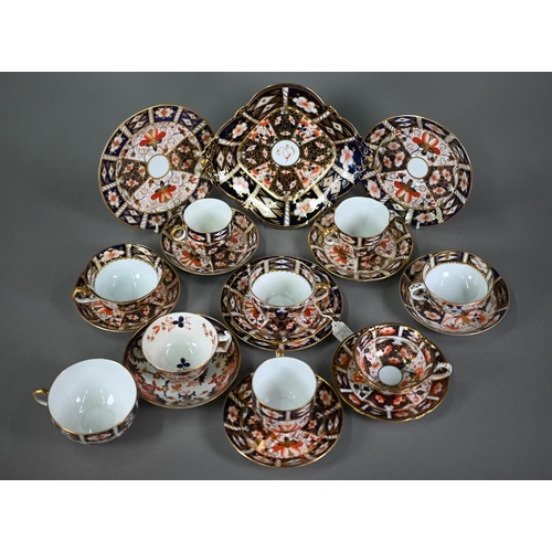 595 - Three Royal Crown Derby Imari trios of tea cup, saucer and plate, to/w five other tea cups and sauce... 