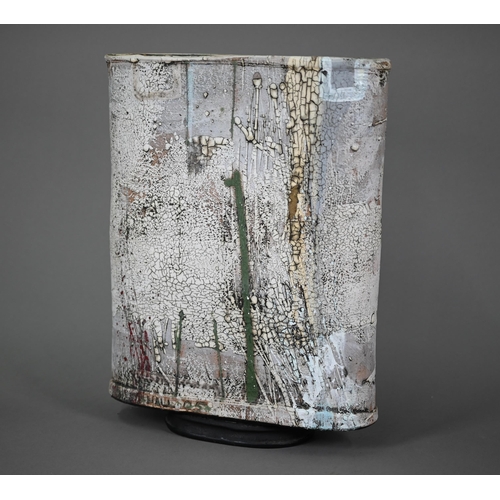 604 - Sam Hall (b.1967), a large studio ceramic vase of flattened oval form with 'splattered' raku-style g... 