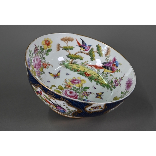 612 - A 19th century Continental porcelain punch-bowl in the manner of the 18th century Worcester factory,... 