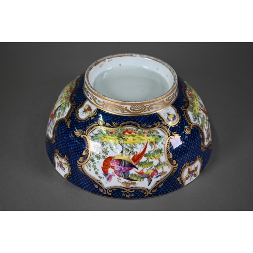 612 - A 19th century Continental porcelain punch-bowl in the manner of the 18th century Worcester factory,... 