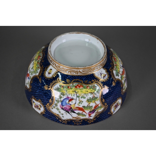 612 - A 19th century Continental porcelain punch-bowl in the manner of the 18th century Worcester factory,... 