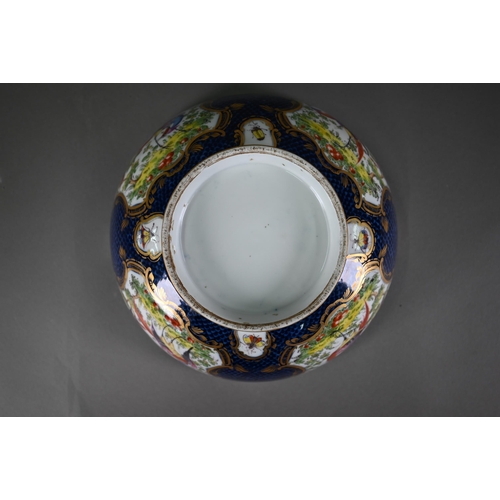 612 - A 19th century Continental porcelain punch-bowl in the manner of the 18th century Worcester factory,... 