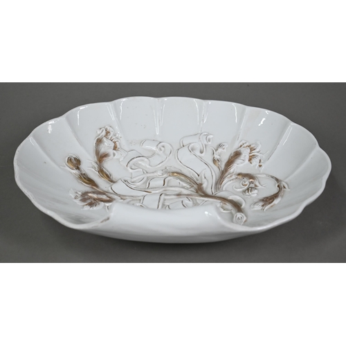 616 - A Meissen porcelain shell serving-dish, moulded with gilt ribbons and flowers, 24 x 32 cm