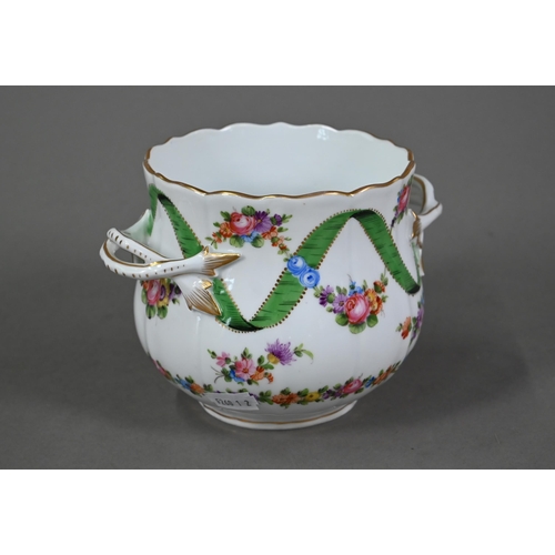 617 - A Dresden porcelain cache-pot with twin handles, painted with floral garlands intertwined with green... 