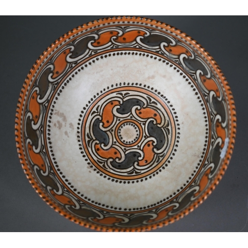 619 - A Crown Ducal 25 cm diameter bowl with tubeline scrolling decoration by Charlotte Rhead (signed), to... 