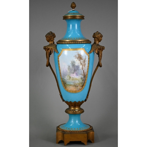 623 - A large 19th century French porcelain vase and cover in the Sevres manner, the reserves painted with... 