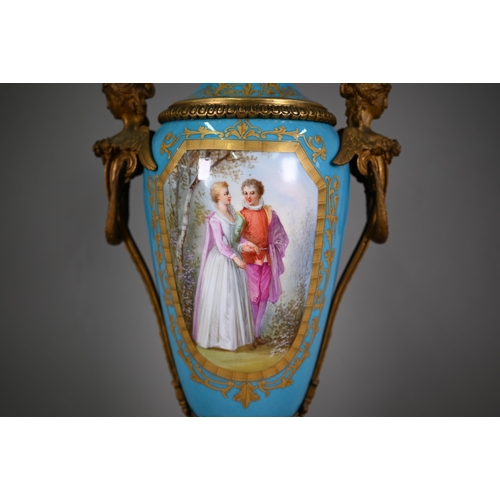 623 - A large 19th century French porcelain vase and cover in the Sevres manner, the reserves painted with... 