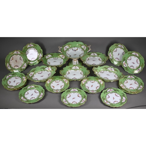 638 - A Victorian Staffordshire china fruit service, printed and painted with floral garlands, with apple-... 