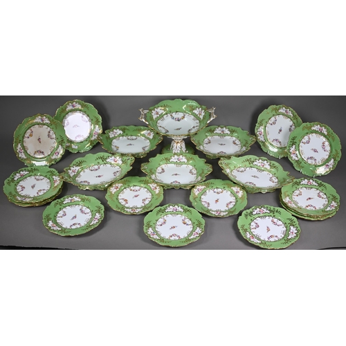 638 - A Victorian Staffordshire china fruit service, printed and painted with floral garlands, with apple-... 