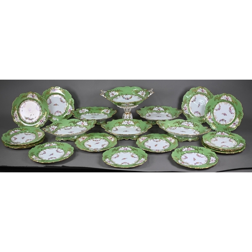 638 - A Victorian Staffordshire china fruit service, printed and painted with floral garlands, with apple-... 