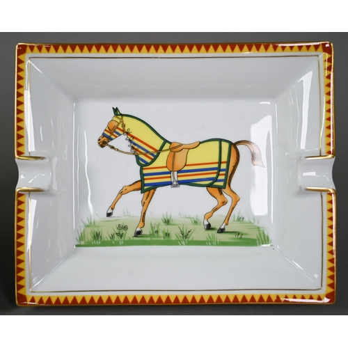 650 - Two Hermes of Paris china ashtrays, printed with racehorses