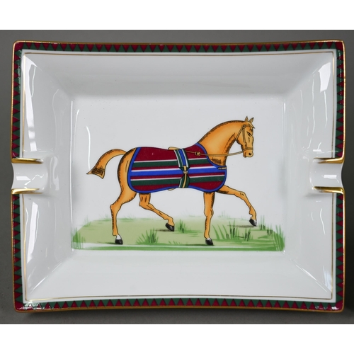 650 - Two Hermes of Paris china ashtrays, printed with racehorses