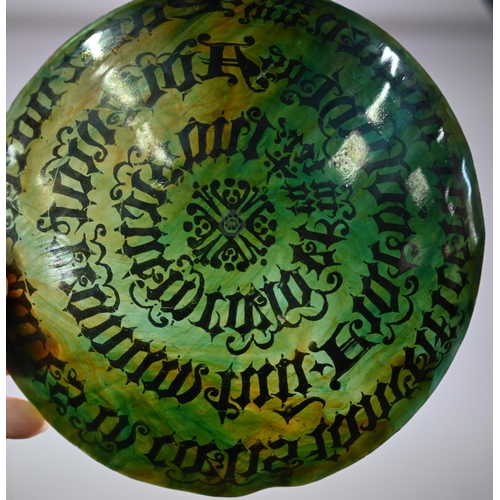 652 - A glass simulated tortoiseshell bowl, decorated with gilded 'Lord's Prayer' in Gothic Latin script, ... 