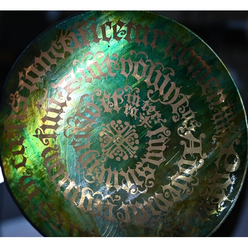 652 - A glass simulated tortoiseshell bowl, decorated with gilded 'Lord's Prayer' in Gothic Latin script, ... 