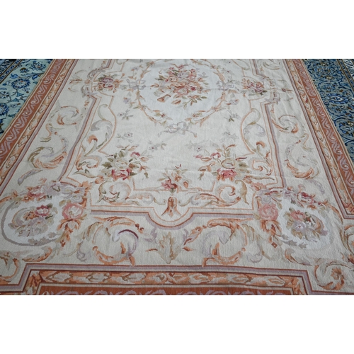 802 - A traditional Savonnerie needlepoint rug, pale camel ground, 266 cm x 173 cm&nbsp;