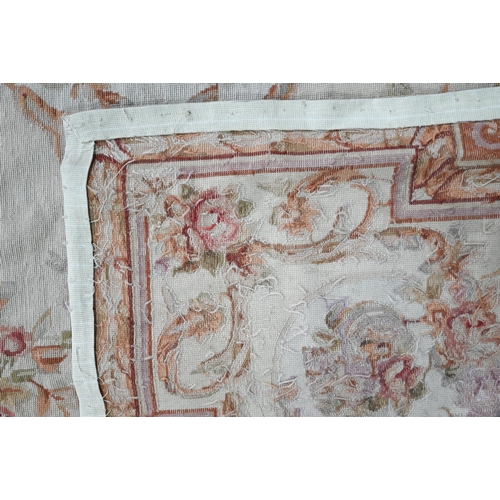 802 - A traditional Savonnerie needlepoint rug, pale camel ground, 266 cm x 173 cm&nbsp;