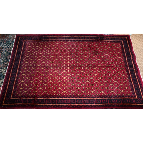 830 - An old Persian-Kurd Uzbek Hoten design rug, red, 242 cm x 149 cm