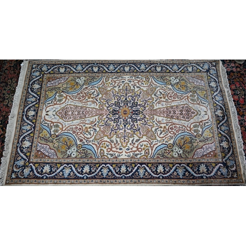 832 - A Persian Tehran design rug, camel ground, 202 cm x 125 cm