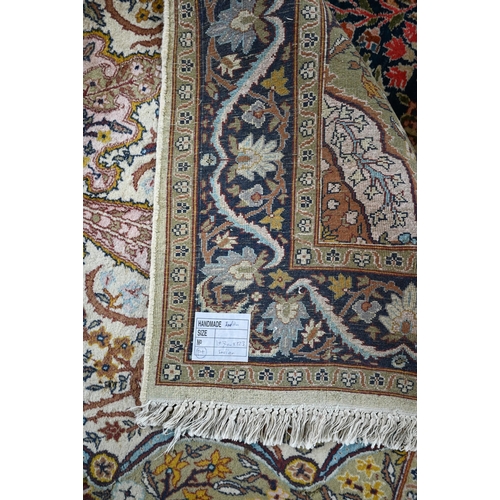 832 - A Persian Tehran design rug, camel ground, 202 cm x 125 cm