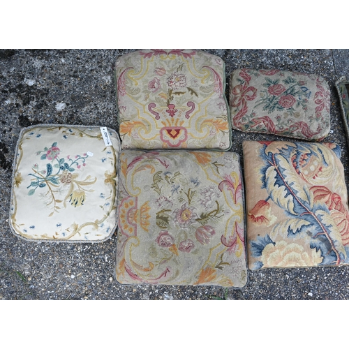 839 - A stack of seven assorted antique tapestry cushions (7)