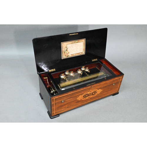 854 - A 19th century Swiss inlaid rosewood cased cylinder music box, the 44 cm cylinder playing twelve air... 