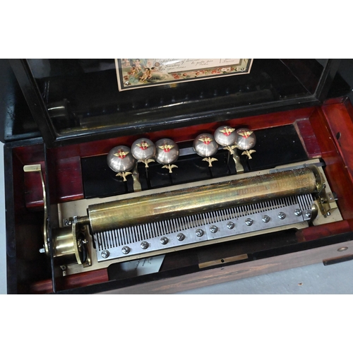 854 - A 19th century Swiss inlaid rosewood cased cylinder music box, the 44 cm cylinder playing twelve air... 