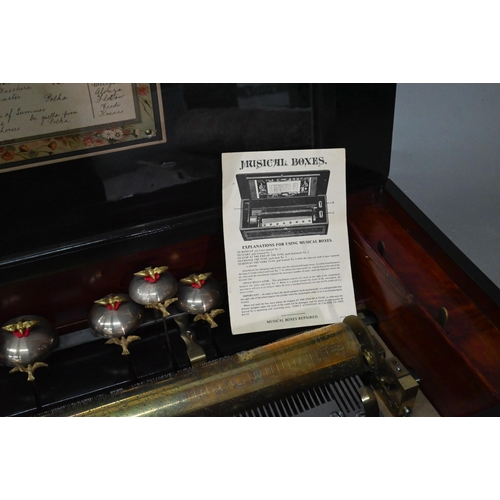 854 - A 19th century Swiss inlaid rosewood cased cylinder music box, the 44 cm cylinder playing twelve air... 