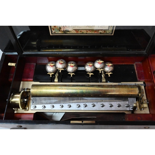 854 - A 19th century Swiss inlaid rosewood cased cylinder music box, the 44 cm cylinder playing twelve air... 