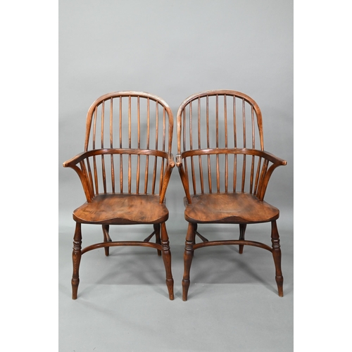 880 - A set of six 19th century style oak and elm crinoline stretcher Windsor chairs, comprising four side... 