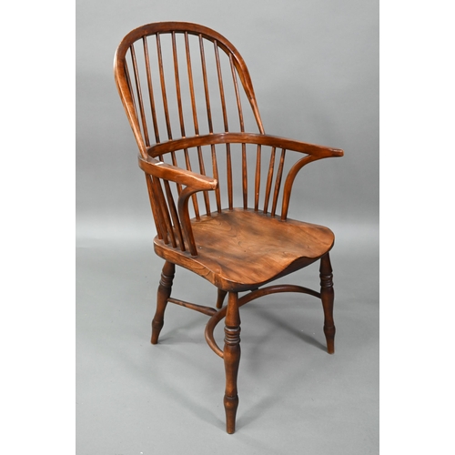 880 - A set of six 19th century style oak and elm crinoline stretcher Windsor chairs, comprising four side... 