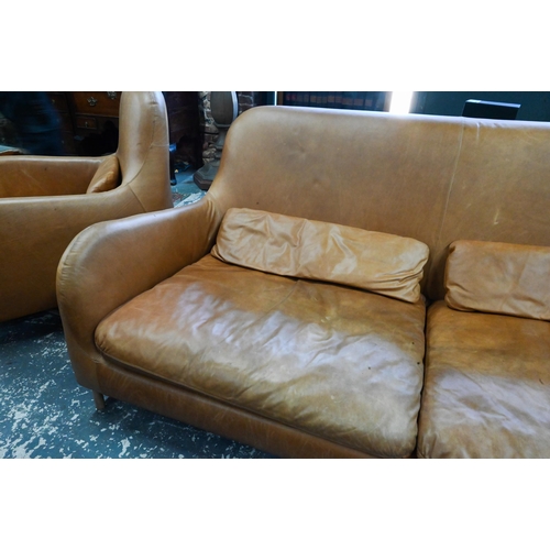 883 - AMMENDMENT - Habitat - tan leather sofa and matching armchair designed by Aaron Probyn, raised on sh... 