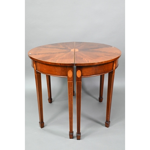 888 - A pair of boxwood inlaid figured mahogany Sheraton Revival demi-lune tables, raised on square taperi... 