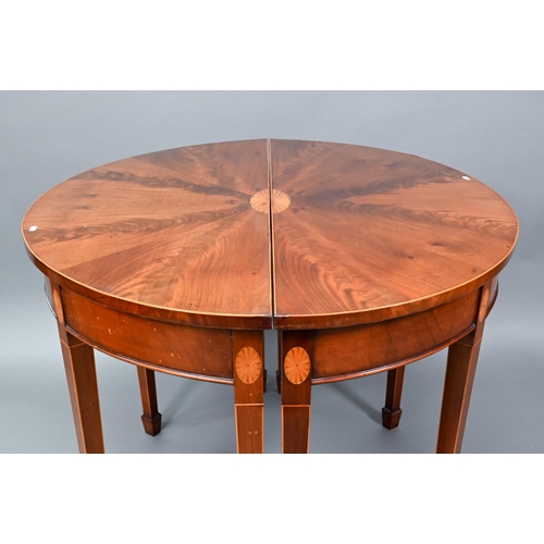 888 - A pair of boxwood inlaid figured mahogany Sheraton Revival demi-lune tables, raised on square taperi... 