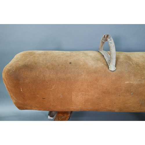 890 - A vintage suede covered gymnasium vault horse, rasied on square adjustable legs - a/f