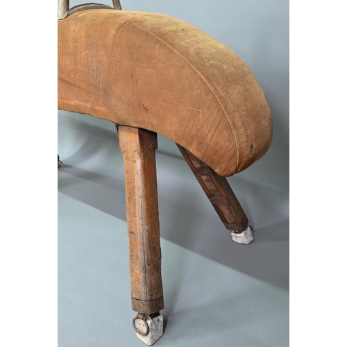 890 - A vintage suede covered gymnasium vault horse, rasied on square adjustable legs - a/f