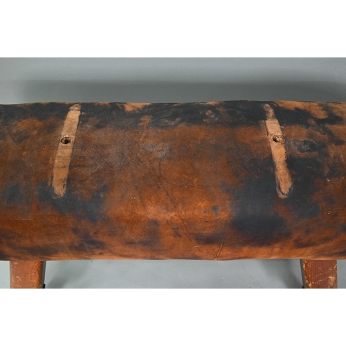 891 - A vintage vault horse, suede covered on adjustable oak legs, approx. 174 cm long